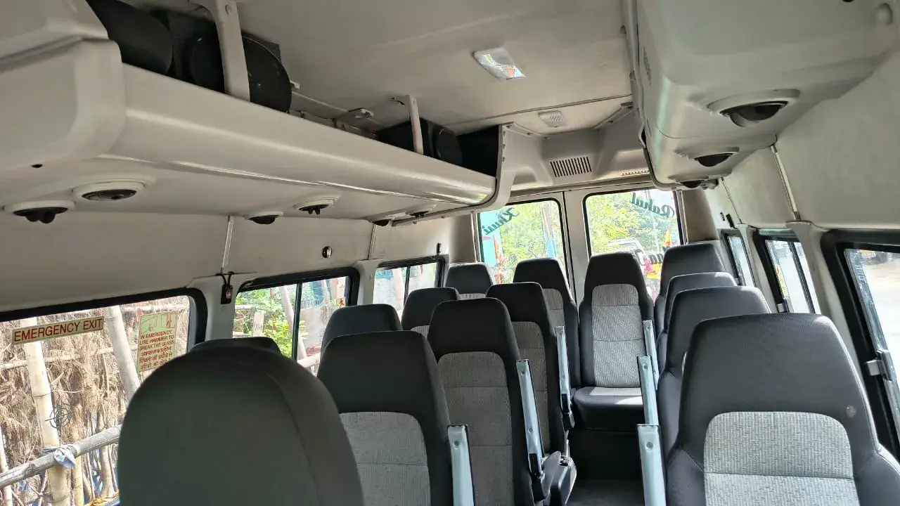 travelagencyinpuri.in-13-Seater-1.webp