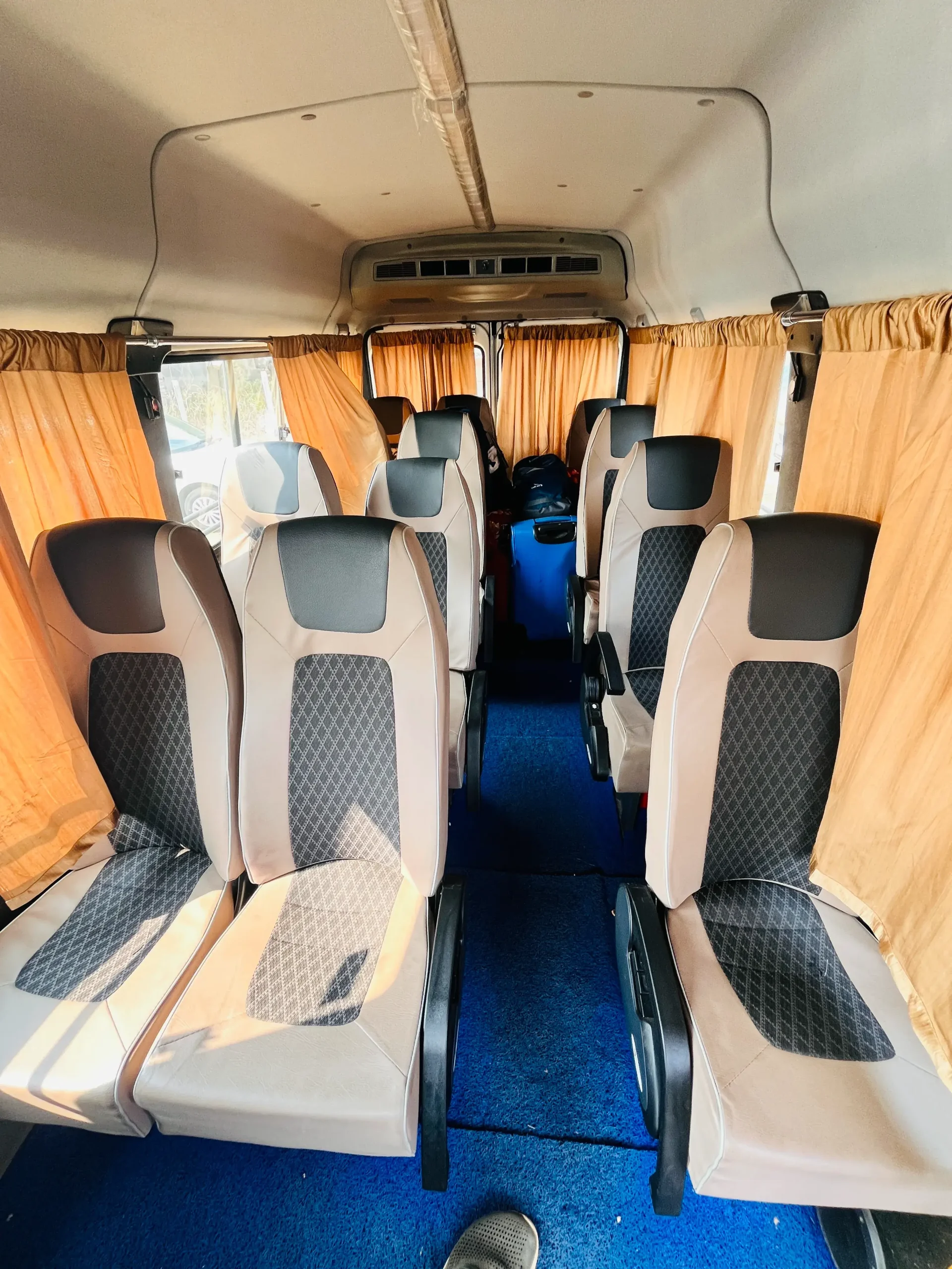 travelagencyinpuri.in-13-seaters-2-scaled.webp